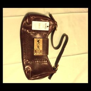 Hugs n Kisses Vintage purse NWT.